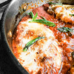 Close up of chicken parmesan in a skillet