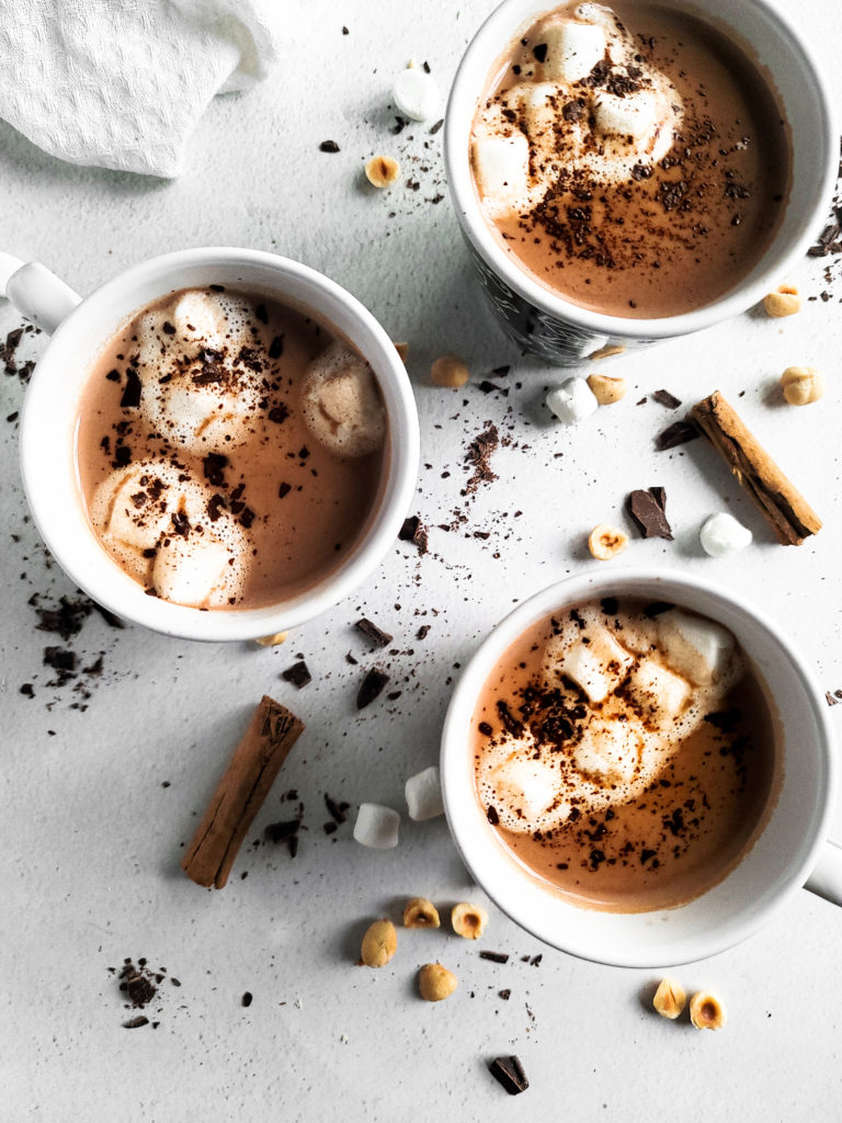 Overhead shot of 3 cups of hot cocoa