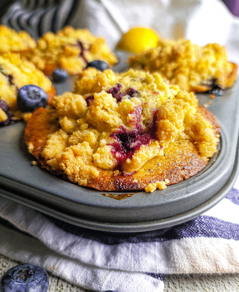 Close up shot of blueberry lemon poppyseed corn muffins